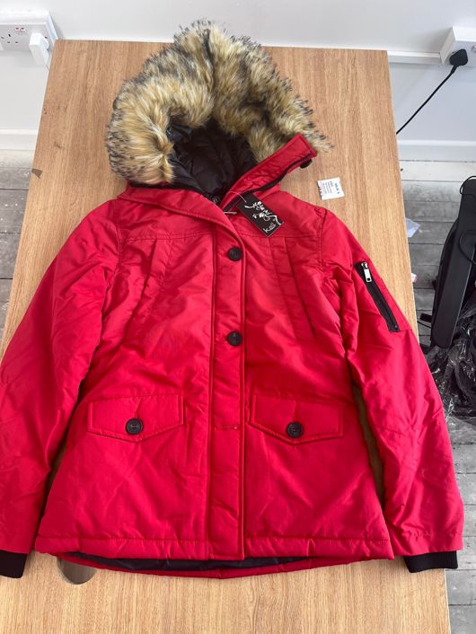 Red Quilted Jacket with Faux Fur Hood and Sleeve Zip Pocket