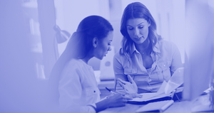Woman working with female adviser EP blue