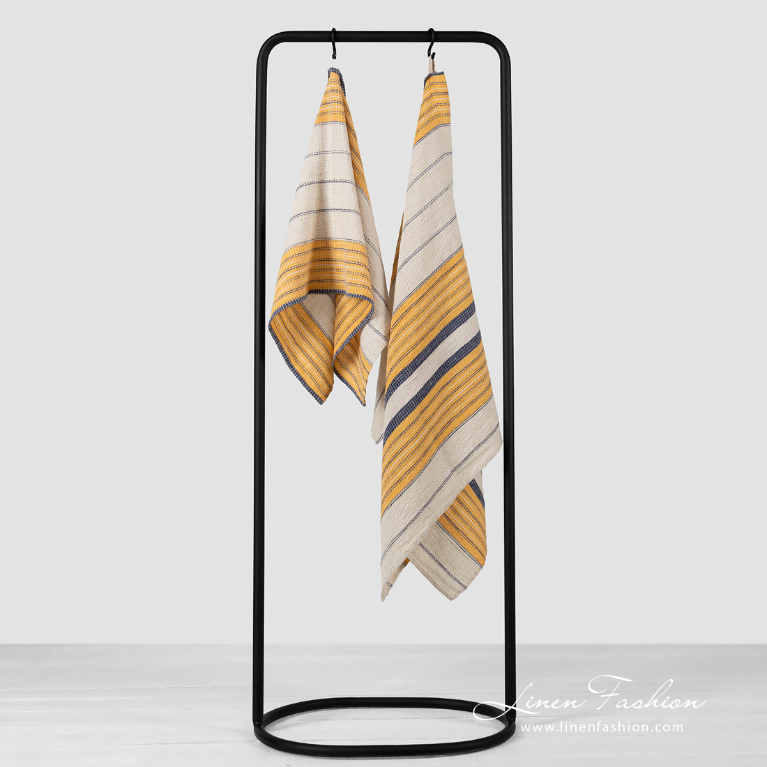 Linen cotton beige striped bath towels.