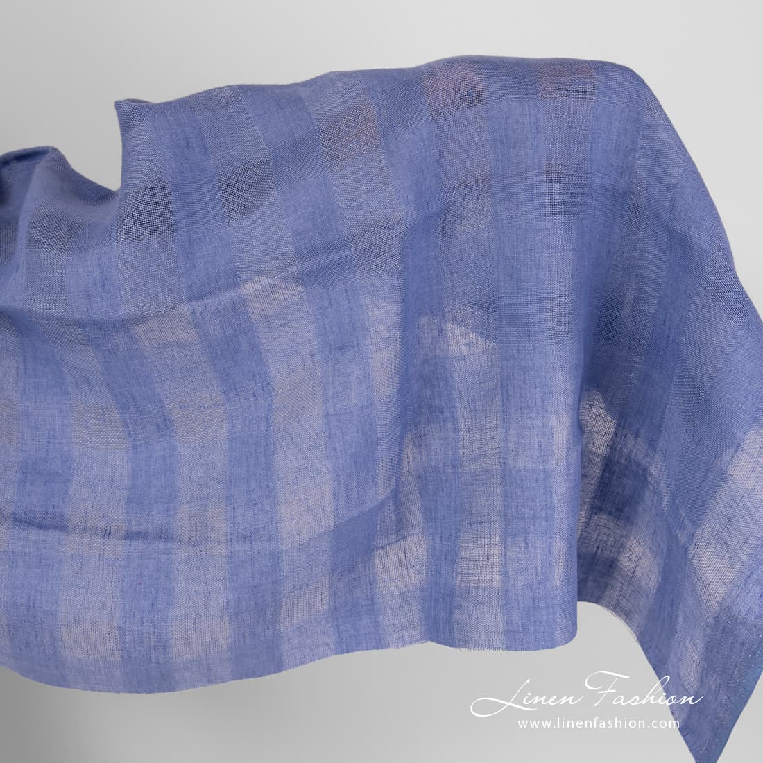 Linen fabric in violet blue checks.