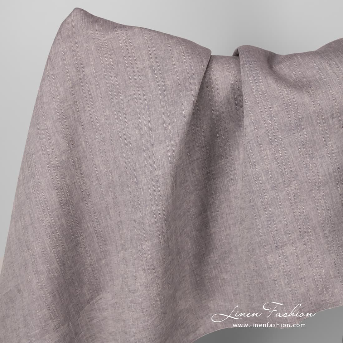 Linen fabric brownish violet striped.