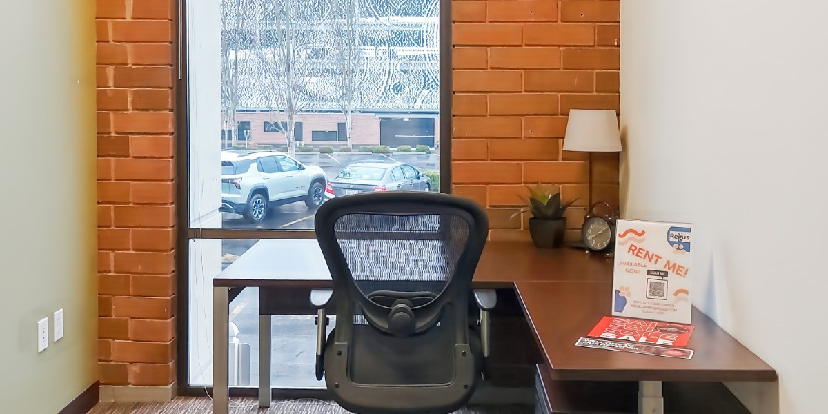 Private office with exposed brick at Regus WSECU Building, Olympia
