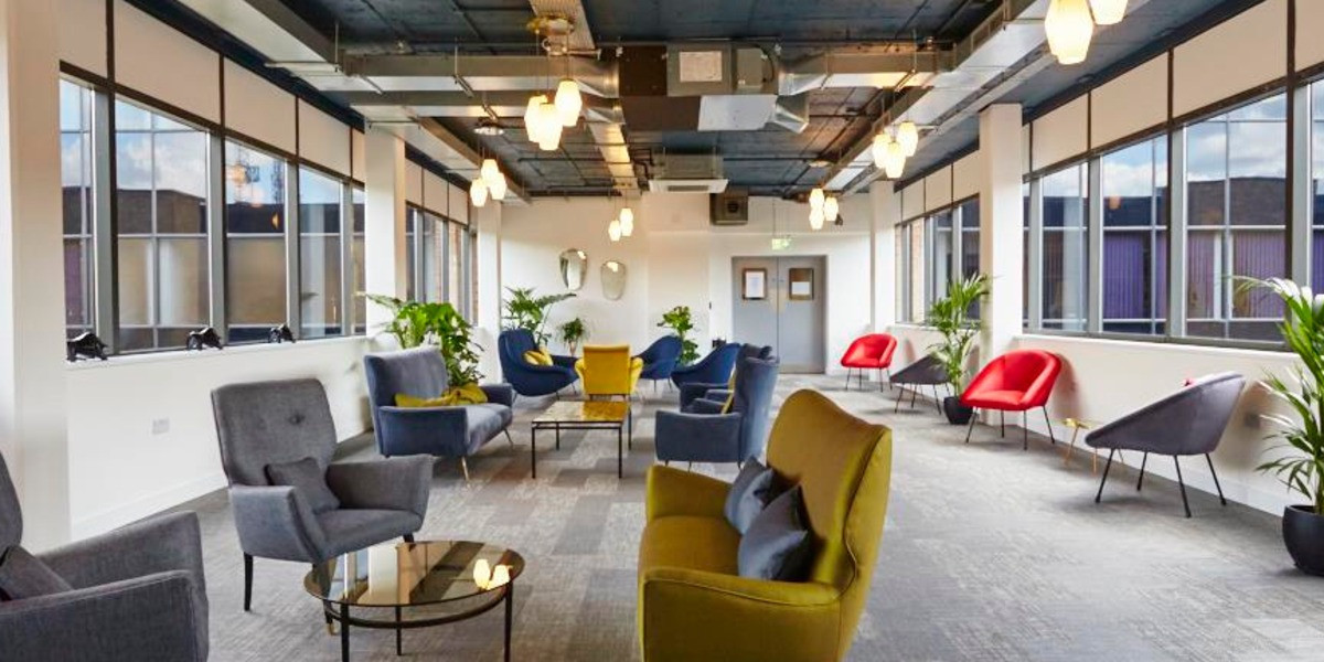 Breakout lounge with armchairs at Bedford Heights