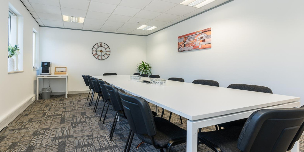 Boardroom table set for a meeting at UBC Warrington