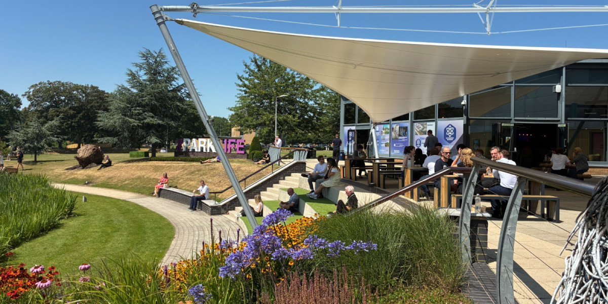 Landscaped outdoor seating area on Birchwood Park near Rutherford House