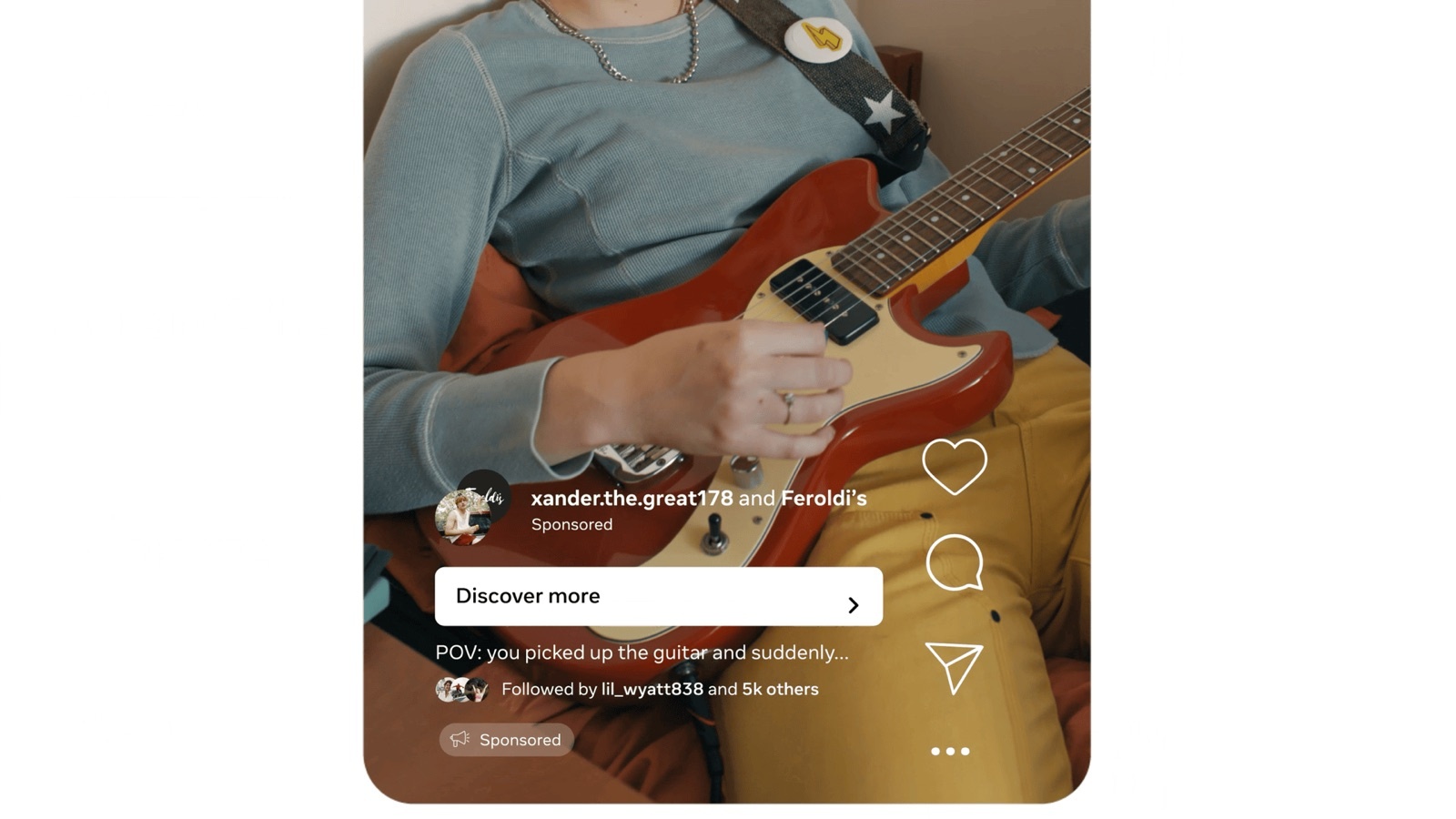 A Meta Reels mock-up of a person playing an electric guitar. The header reads xander.the.great178 and Feroldi's, Sponsored, with a Discover more button and the caption POV: you picked up the guitar and suddenly.