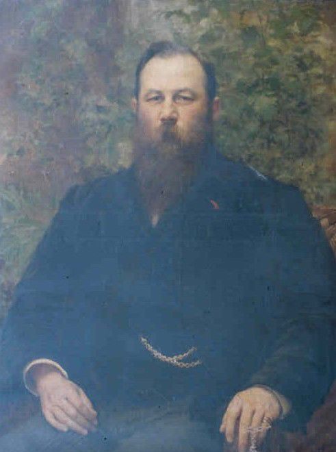 Painted portrait of Samson Fox, showing a large man with brown hair and long brown beard.  He has on a dark coat and a gold watch-chain can be seen.