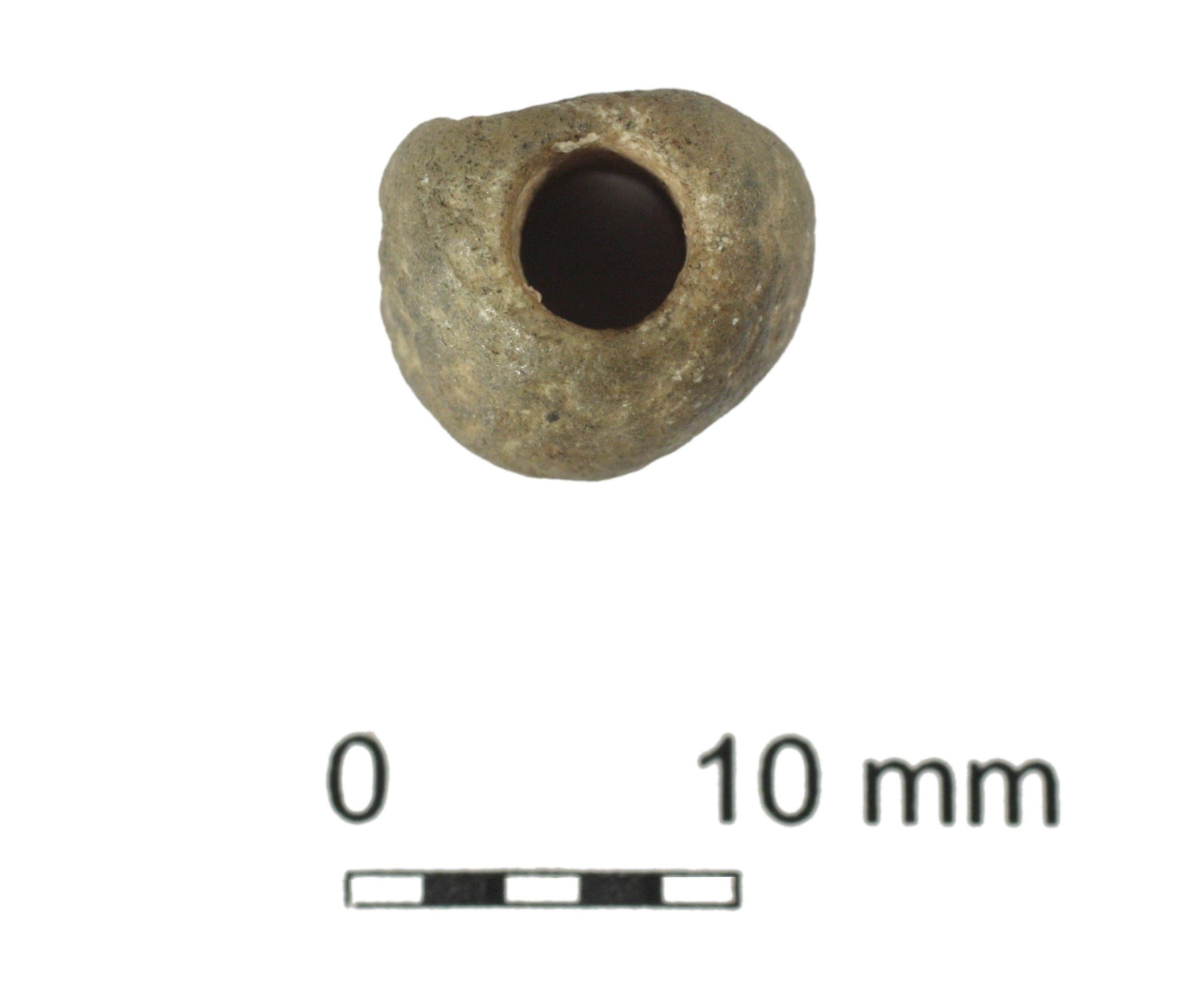 Prehistoric stone bead, round shaped with a hole in the middle, showing length marker 10mm