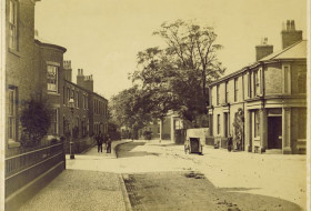 Avenham Lane in 1862  with a wide street and grand houses.