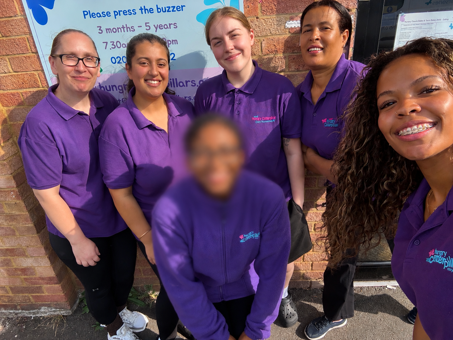 Northolt charity walk team outside Hungry Caterpillar Day Nursery Northolt
