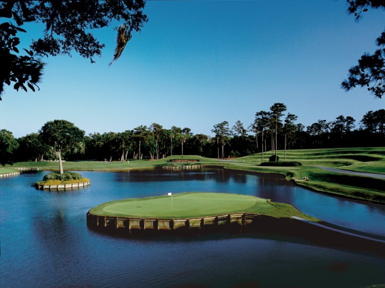The famous 17th hole at TPC Sawgras in florida - a bucket list golf tour!