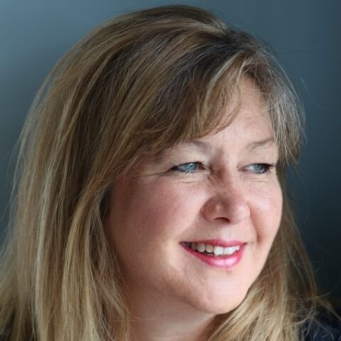 View the profile of Louise Nicholls Portrait photograph of Louise Nicholls