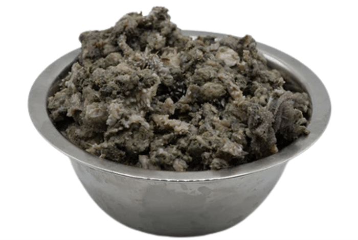 a metal bowl filled with cooked green tripe