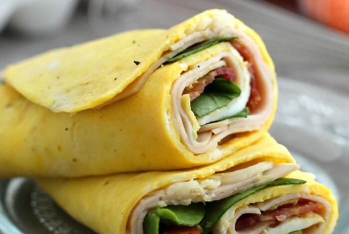 a turkey egg wrap with spinach