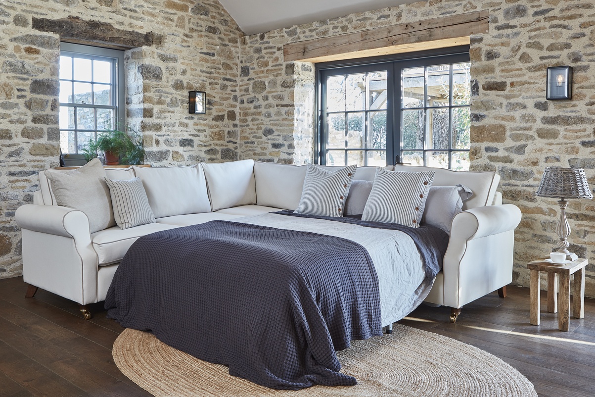 THE KENDAL 3 SEATER CORNER SOFA IN STAIN RESISTANT RECYCLED COTTON NOUGAT WITH DARK OAK FEET