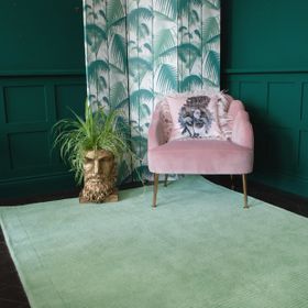 Gold Titan Bust Planter, £94. Scalloped Oyster Velvet Chair Blush Pink, £395