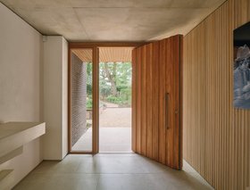 Urban Front Ridge pivot door in iroko