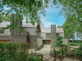 Urban Front Ridge pivot door in iroko