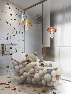 The Tropical Hideaway | marble bathroom for kids in colorful tones with Mushroom pendant lamp, white bathtub, gold tap, towel rack, and wallpaper