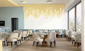 The Family Fun Club | yellow, white, and blue paint coffee shop in mid-century modern style with retro gold table, cream dining chair, wallpaper, and wood flooring