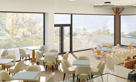 The Family Fun Club | mid century modern coffee shop and colorful kids corner with retro coffee table, white dining chair, Marshmallow sky blue activity table, Bonbon blush pink chair, Baloo orange chair, and wood flooring