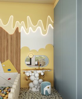 The Family Fun Club | yellow and blue paint kids bathroom with Bubble Gum small wall mirror, Elephant stool, gold and white washbasin, and terrazzo flooring