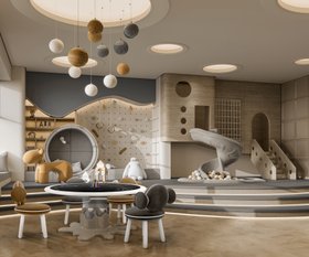 Playroom | neutral play and study area in terracotta, dark, and grey tones with Bonbon chair, Marshmallow activity table, playful suspension lamp, climbing wall, slide, wood flooring, and staircase