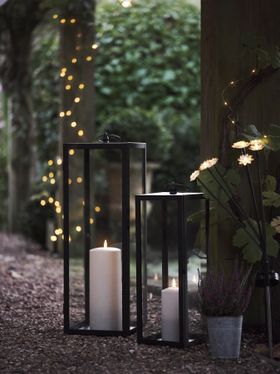 Pair of Tall Lanterns with Pathway Illumination