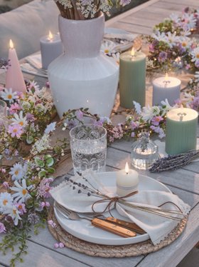 Outdoor Dining Table Place Setting wtih TruGlow® Candles & Flower Garland