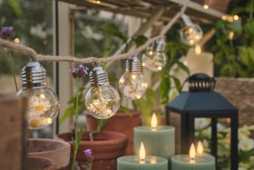 Botanical Greenhouse Styling with Festoon Lights and TruGlow® Outdoor Candles