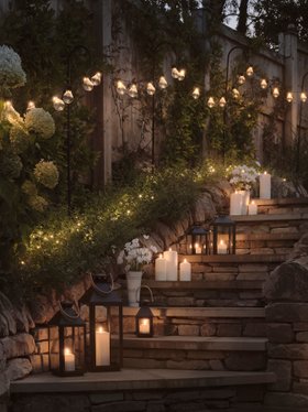 Outdoor Spring Evening Glowing Lifestyle with TruGlow® Waterproof Candle, Lanterns & Fairy & Festoon Lights