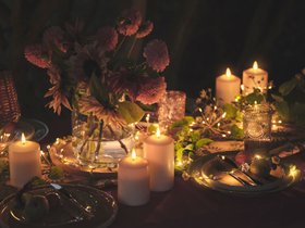 Glowing Al Fresco Spring Dining with TruGlow® Candles & Flower Garland