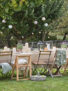 Summer Garden Dining with Festoon Lights & TruGlow® Candles