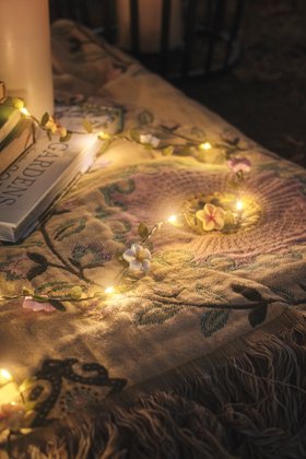 Outdoor Spring Evening Picnic with Glowing Flower Garland