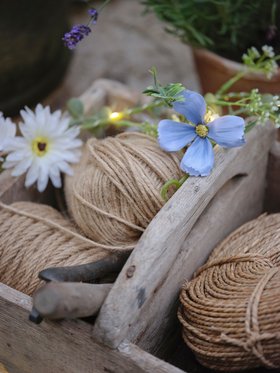 Summer Greenhouse with Glowing Flower Garland