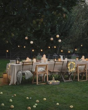 Glowing Summer Garden Dining with TruGlow® Candles, Festoon Lights & Lanterns