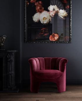 Reading Corner | Hera Deep Plum Armchair in curvy style and floral wall art