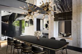 Dining Room | dark paint dining area with Beyond dining table, Supernova chandelier, and vase