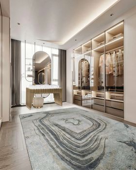 Bedroom Closet | bedroom dressing area with Symphony gold vanity table, suspension mirror, wardrobe, and Agatha blue rug
