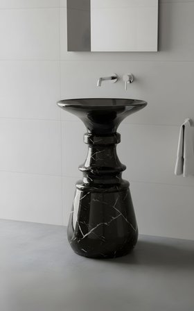 Service Bathroom | the sculptural dark marble Petra freestanding and tap in this black and white bathroom