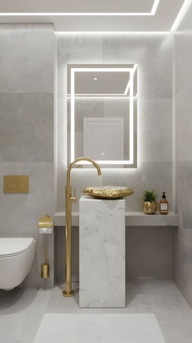 Bathroom | the sculptural white marble Stonehenge freestanding in gold details, wall mirror, and tap