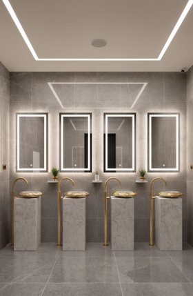 Bathroom | the sculptural white marble Stonehenge freestanding in gold details, wall mirror, and tap