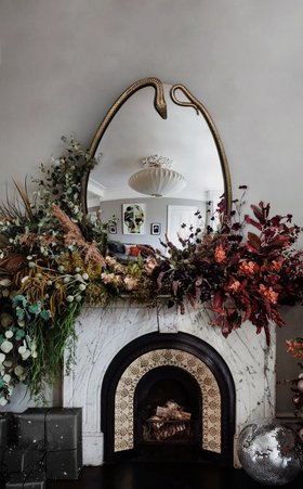 Christmas Season | Serpentine mirror, fireplace, and christmas decor