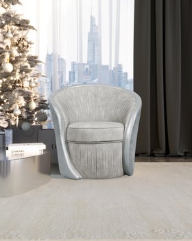 Christmas Season | cosy living room with Bloom curvy blue armchair and christmas tree