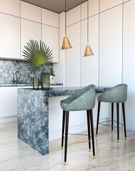 Kitchen | blue marble kitchen island with Aberdeen curvy wood bar stool, Gia gold pendant lamp, vase, and white cabinet for storage