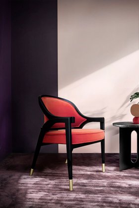 Living Room | purple and white paint reading corner with Arenda curvy peach and dark chair and cosy rug