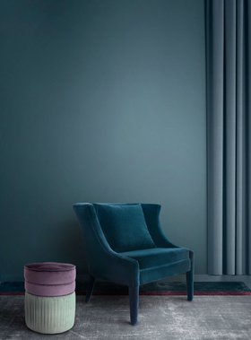 Living Room | teal paint reading corner with Athina curvy blue chair, Sophia cosy purple and grey stool, and cushion