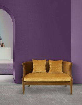 Living Room | purple paint reading corner with Athina curvy yellow sofa and cushion