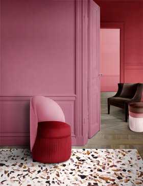 Living Room | lilac paint reading corner with Venice curvy deep red chair and terrazzo rug