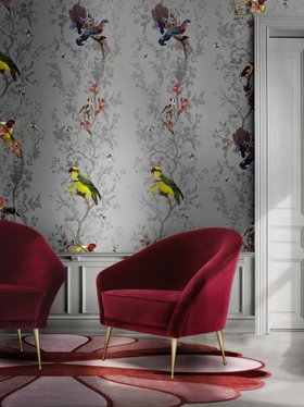 Living Room | cosy reading corner with Chiclet curvy deep red armchair, Mermaid rug, and nature-inspired wallpaper